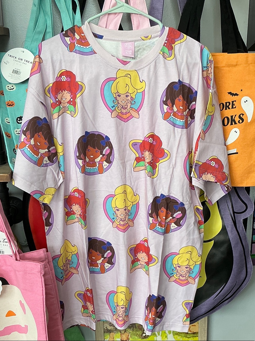 Polly Pocket Graphic Tee with Colorful Cartoon Faces AOP